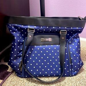 Laptop bag, very convenient and many pockets to fit in a lot .